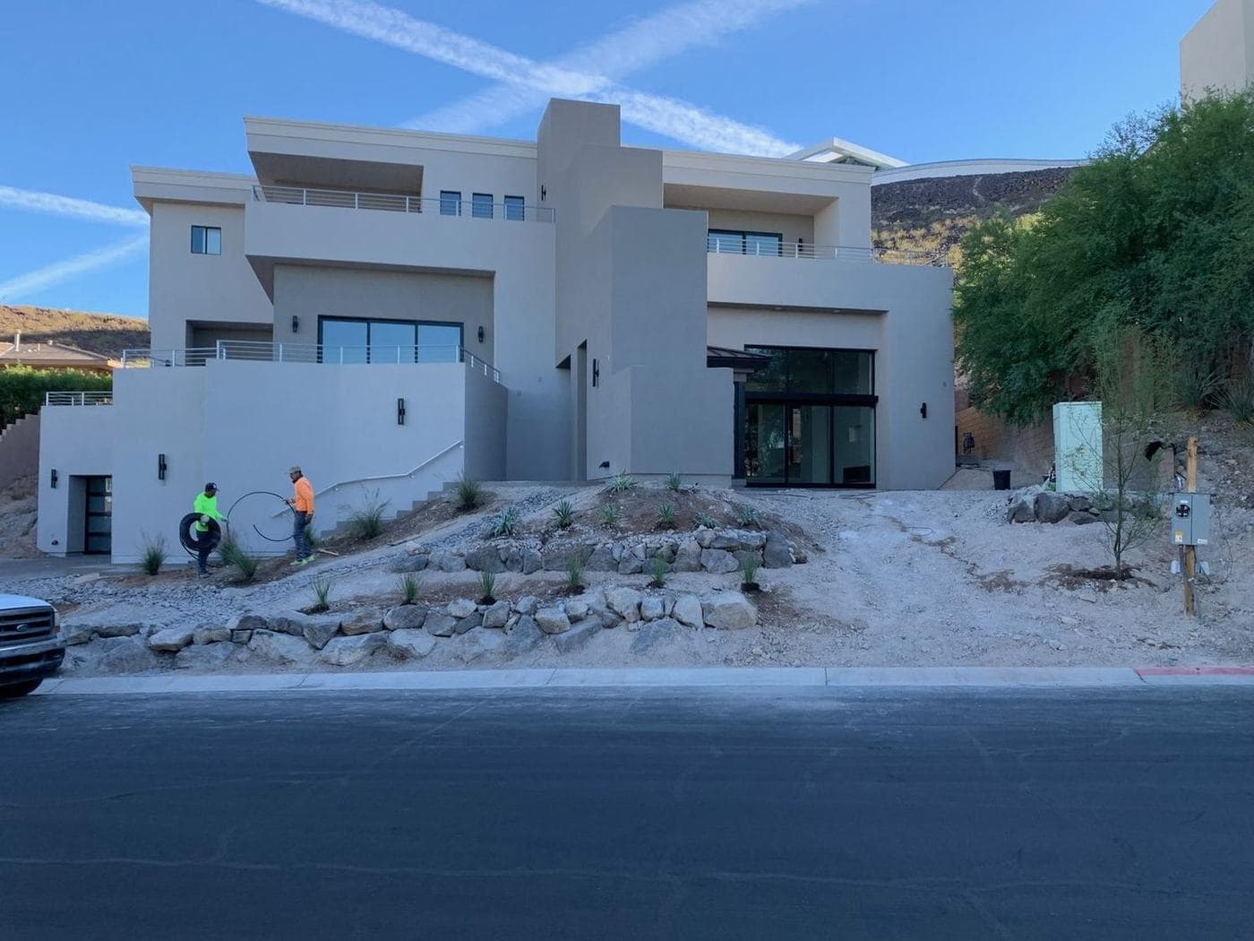 Modern commercial building with desert landscaping and boulder work by A1