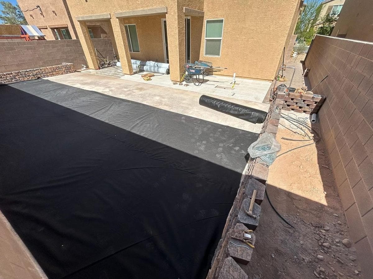 New-Build Backyard: Turf, Border Wall & Planter — during construction 1