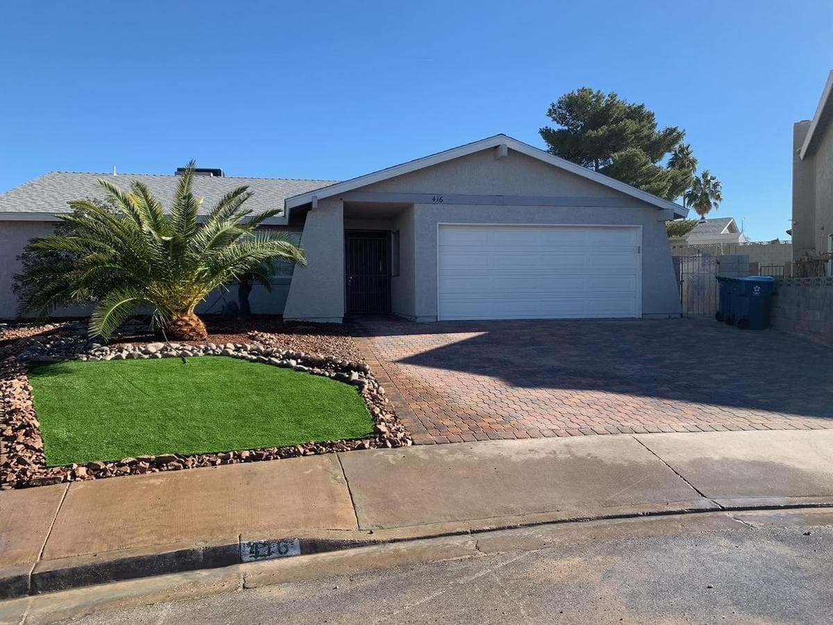 Front Yard: Paver Driveway & Turf Island — after 2